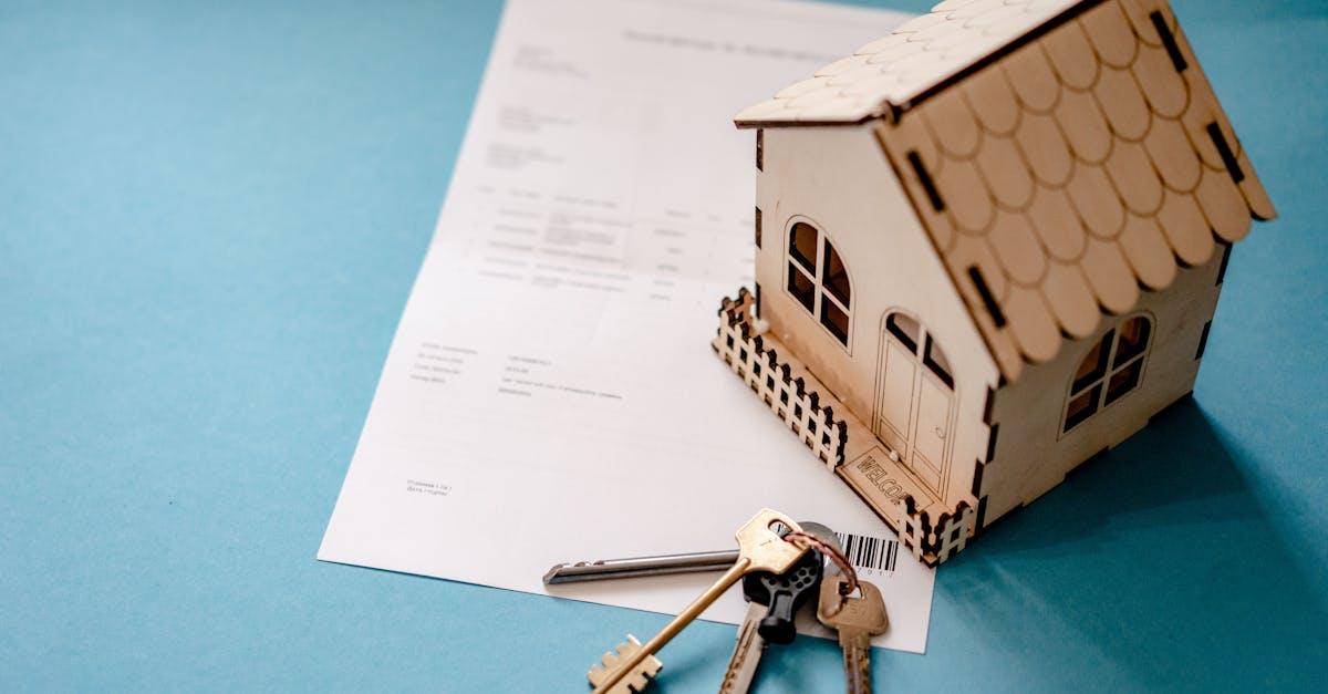 Landlord reviewing property expense documents at a desk
